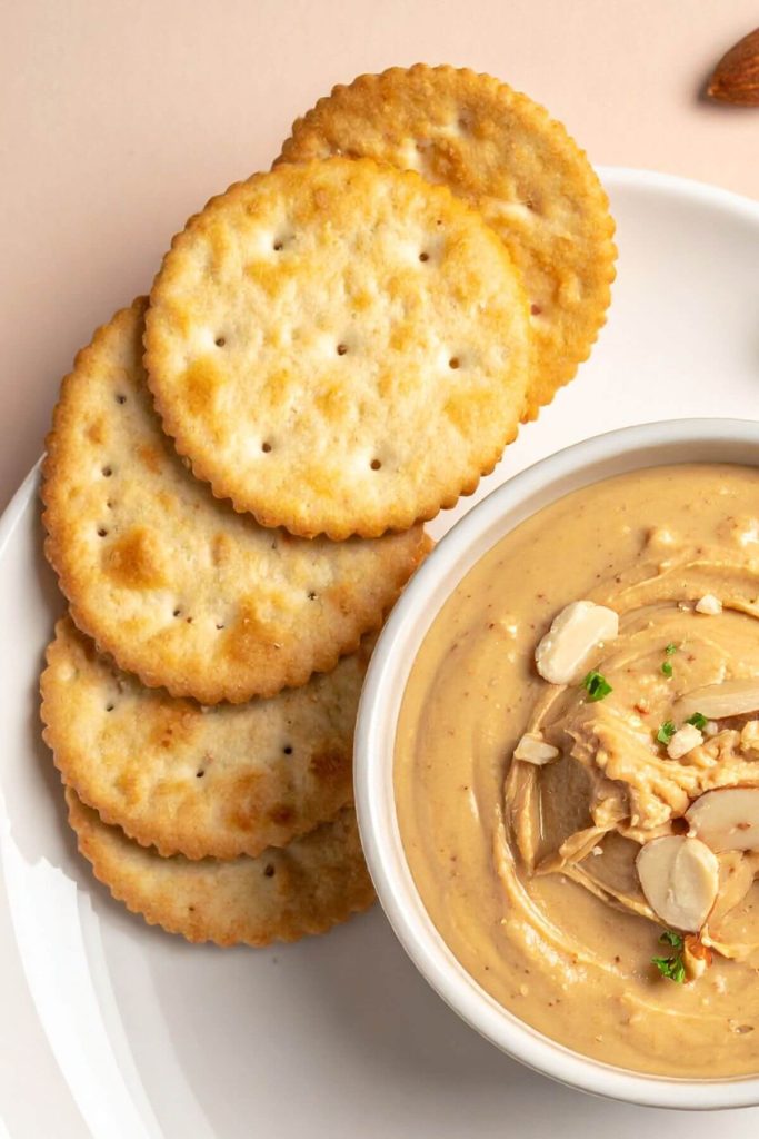Small bowl of Almond butter and crackers