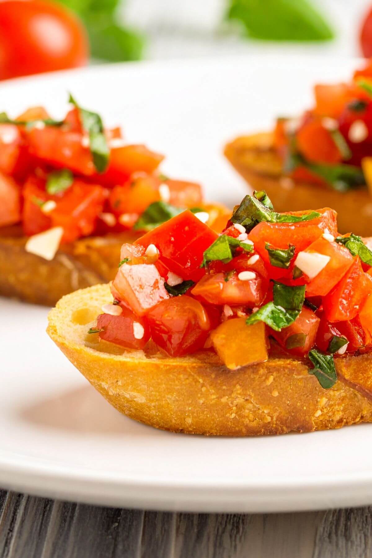 Vegan Bruschetta on a plate with basil