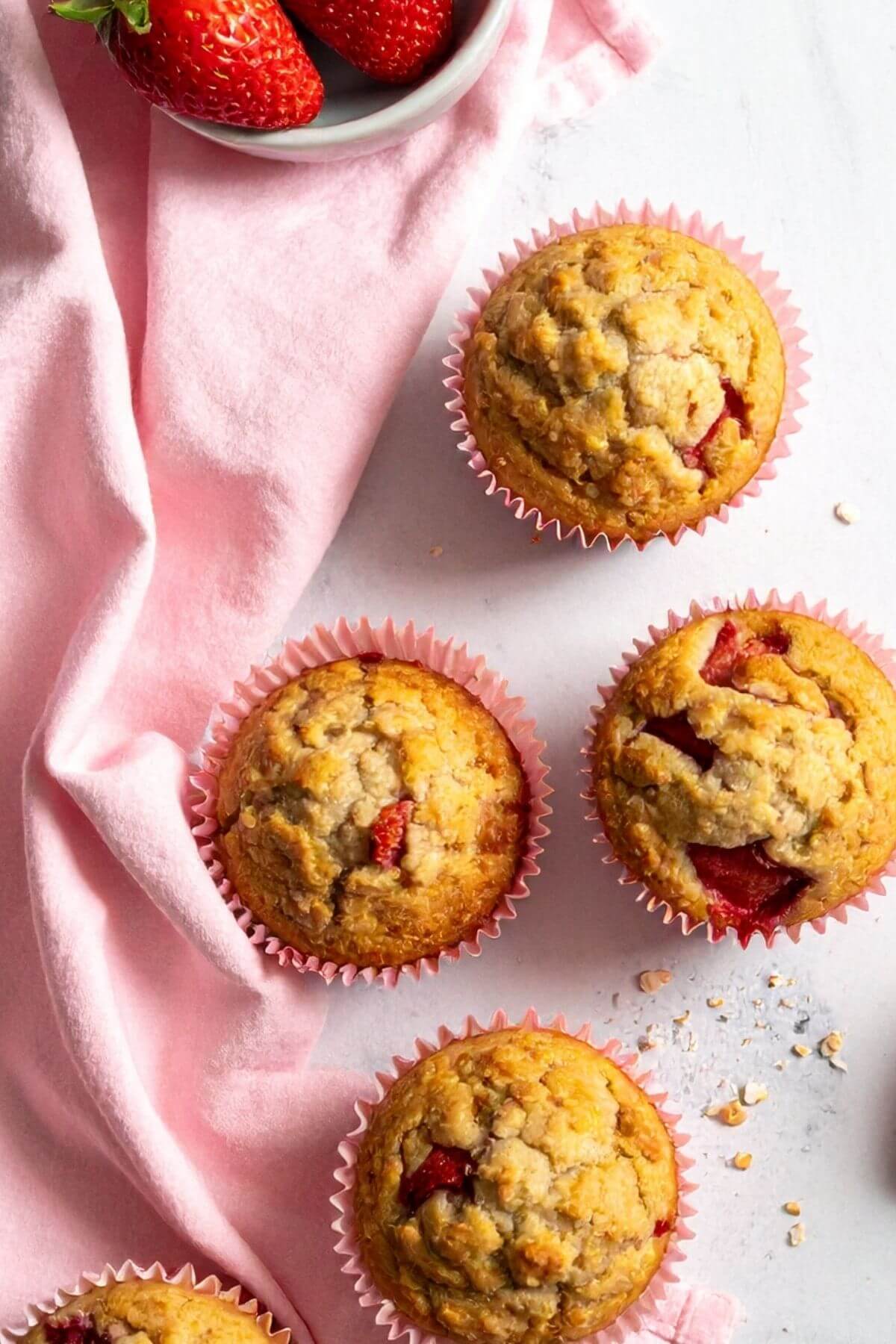 Vegan Strawberry Muffins on a pink napkin