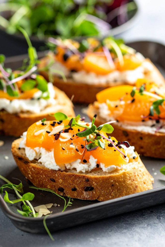 Apricot, Almond, Vegan Feta Crostini with microgreens
