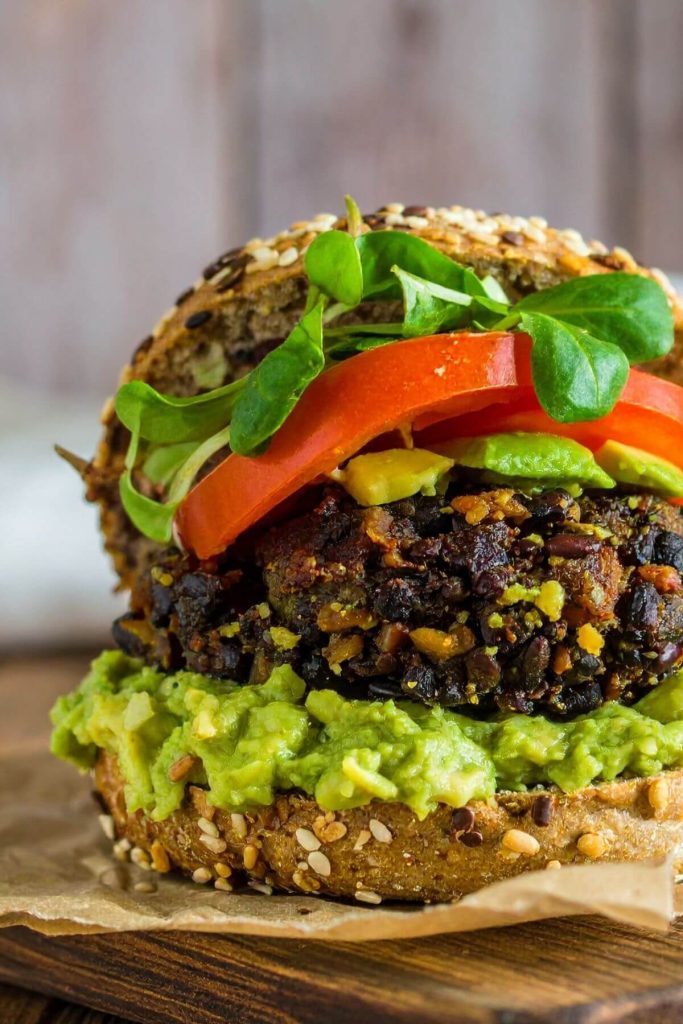 Cilantro, Lime, Black Bean Burger with gaucamole and tomatoes and lettuce on a bun