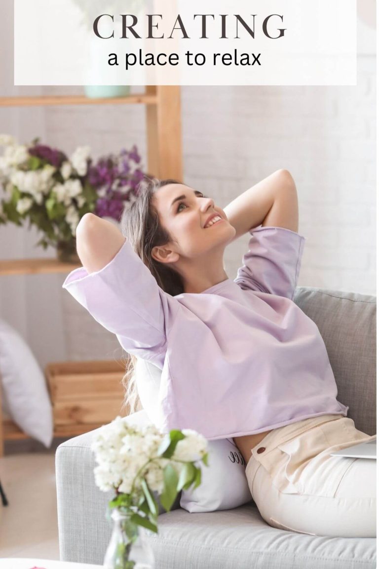 Person relaxing on couch with flowers