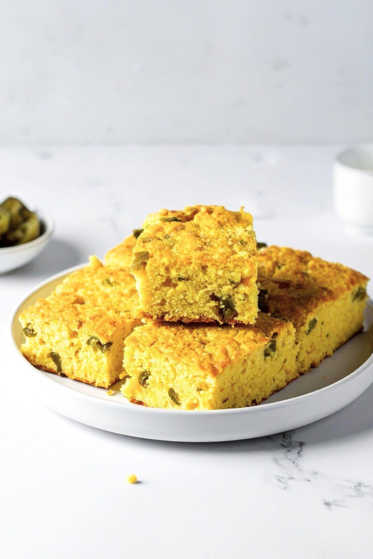 Stacked sliced Jalapeno Bread on a plate