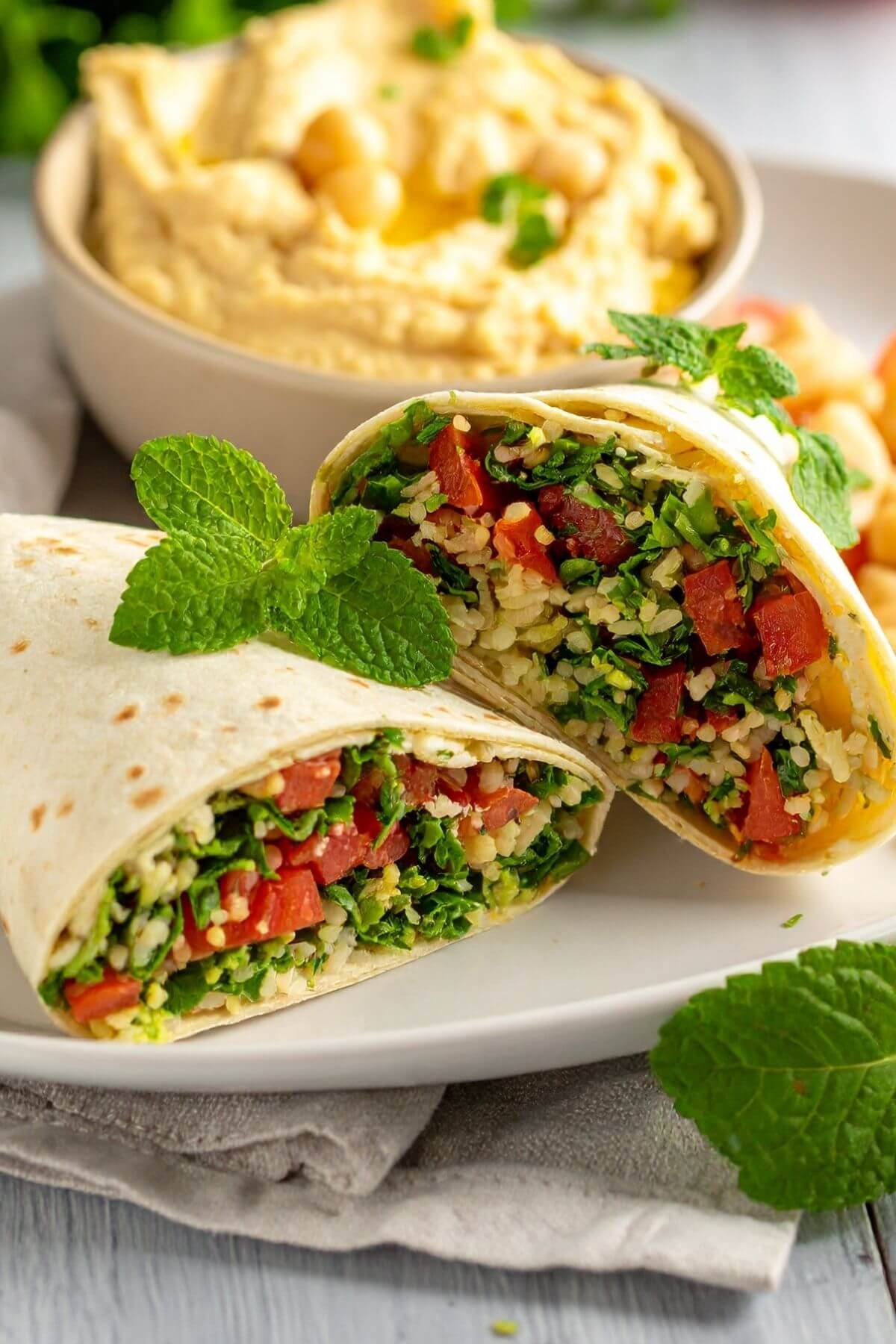 2 Hummus Tabbouleh Wraps on a plate for lunch or dinner