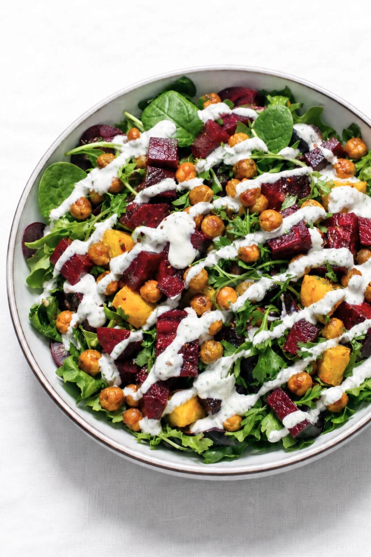 Chickpea salad with roasted beets and creamy drizzle