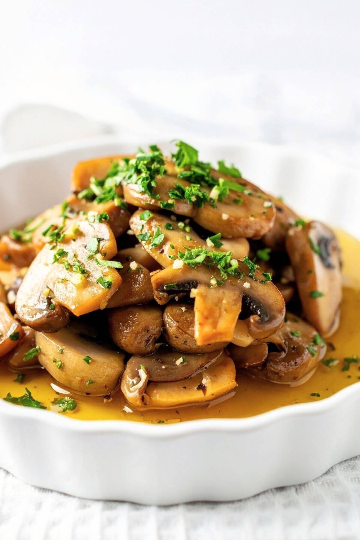easy sautéed garlic mushrooms vegan style with herbs and butter sauce