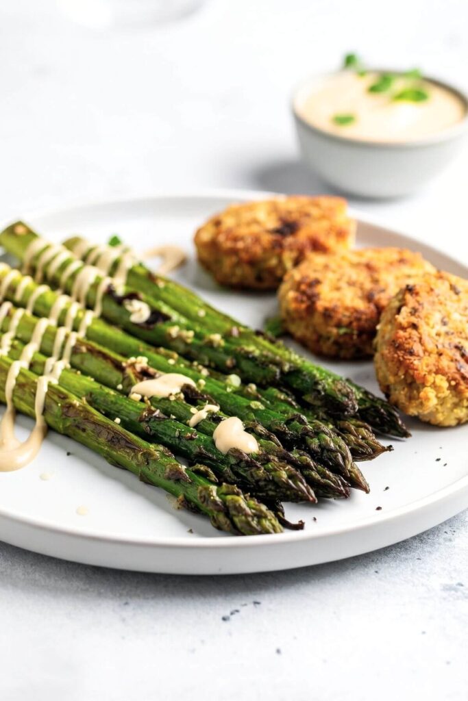 Simple roasted asparagus with creamy tahini and veggie patties for dinner
