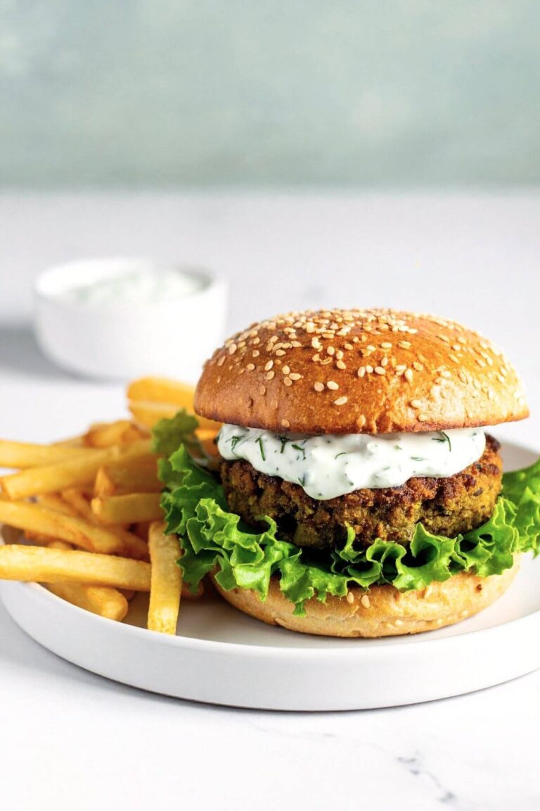 Vegan Lentil Burger with french fries on ths side.